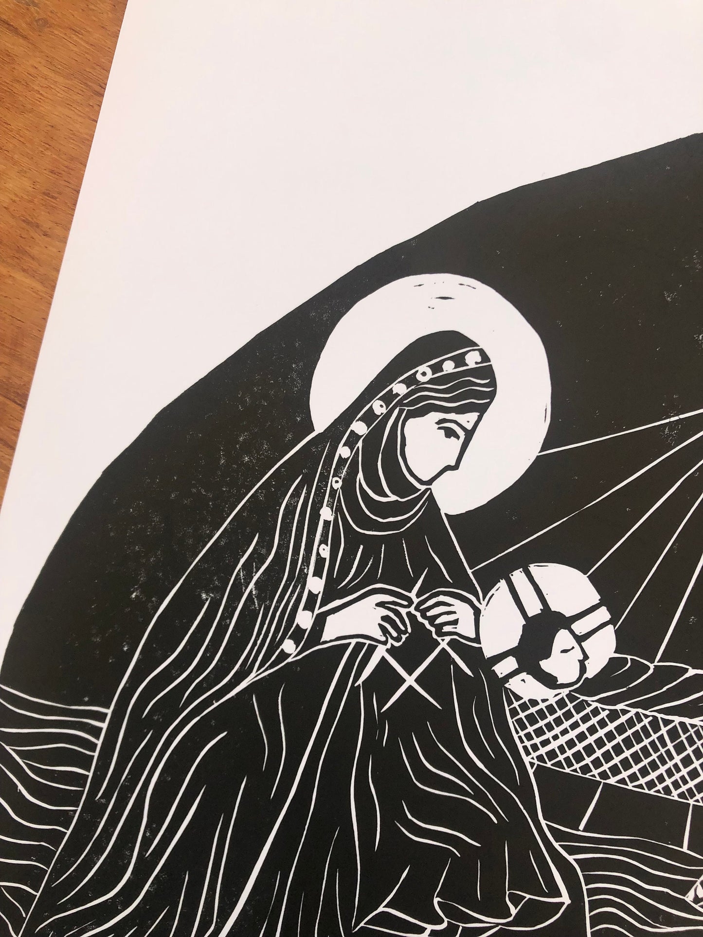 'The Seamless Robe' A4 Linocut Print (Knitting Madonna)