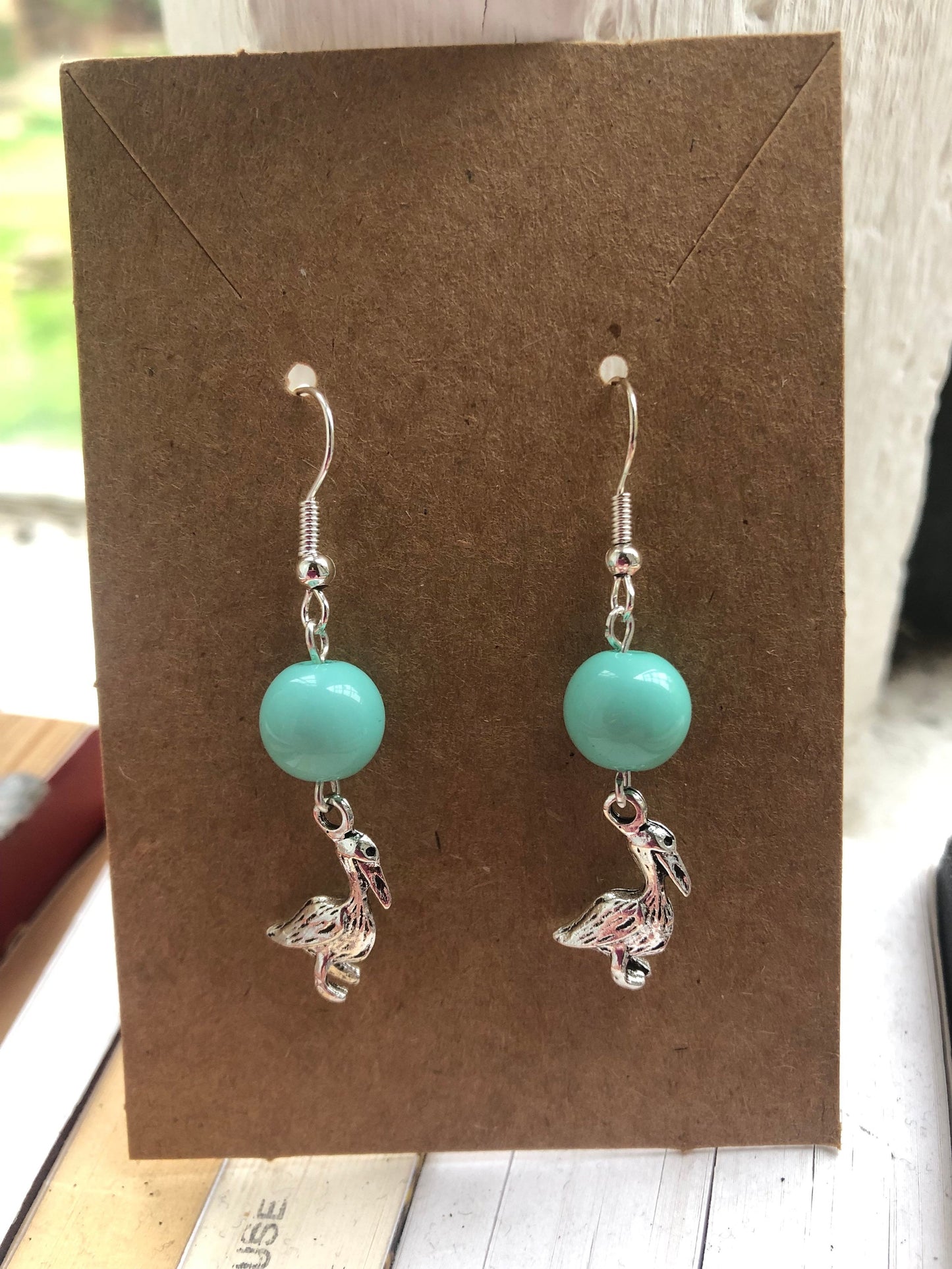 The Pelican in her Piety Earrings